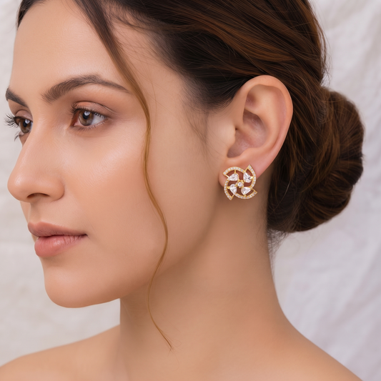 Gold Plated Brass Pinwheel Swirl Stud Earrings with Pear-Cut and Pavé Crystals