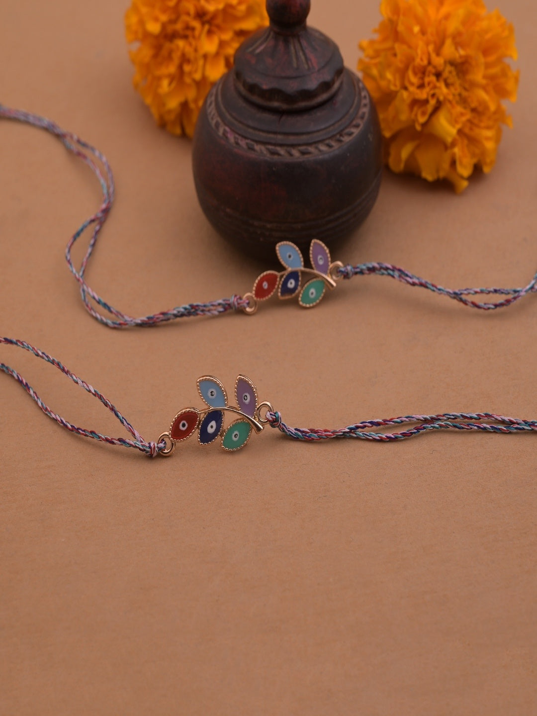 Rose Gold Flower Evil Eye Rakhi Blue Thread Pack of 2