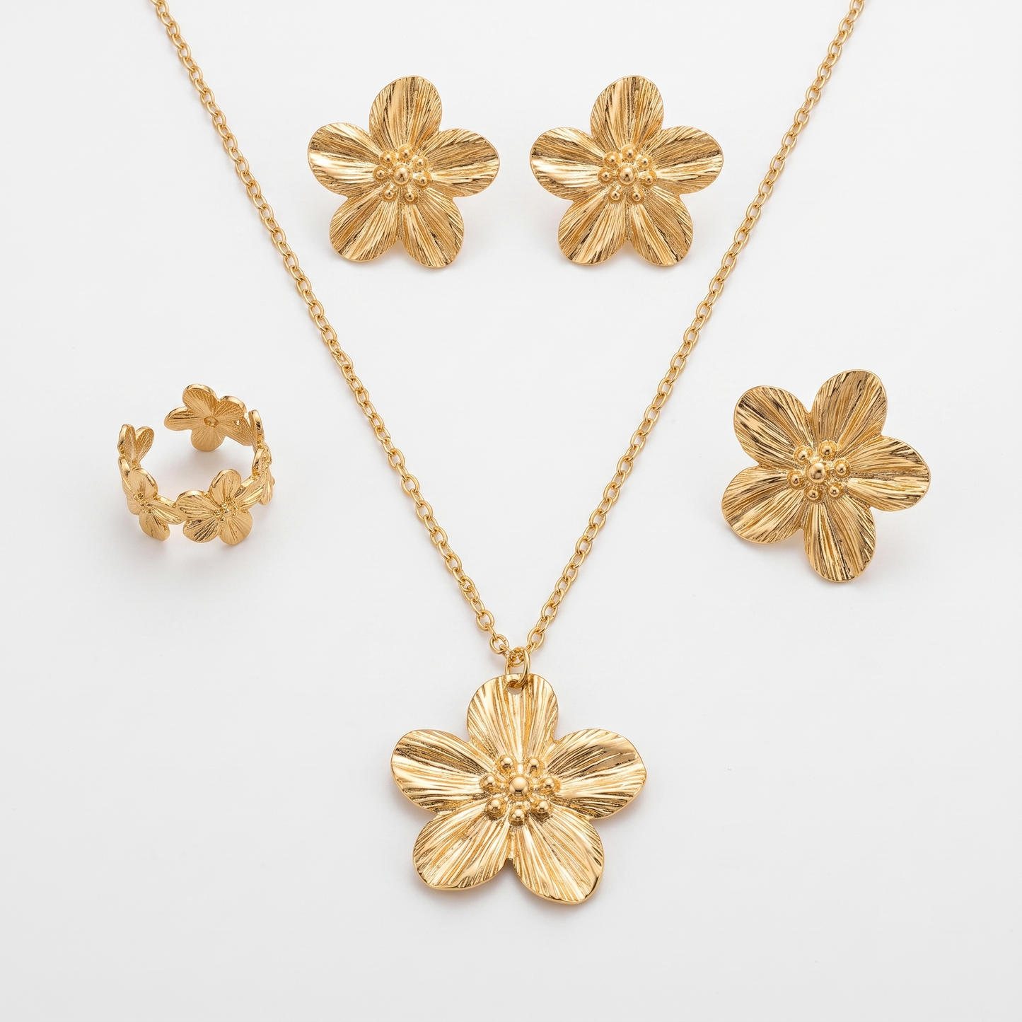 Gold Toned Brass Flower Necklace, Earrings And Ring Set