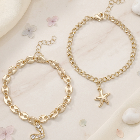 Gold Toned Brass Charm Bracelet Set Of 2