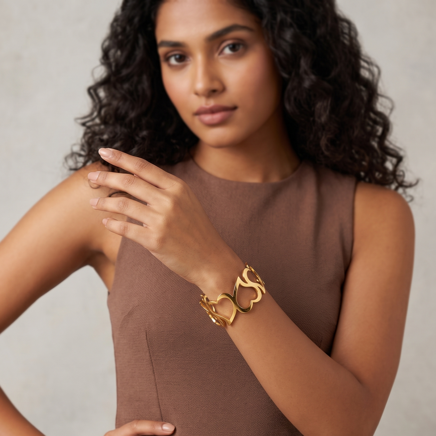 Gold Toned Brass Heart Cutout Cuff Bangle