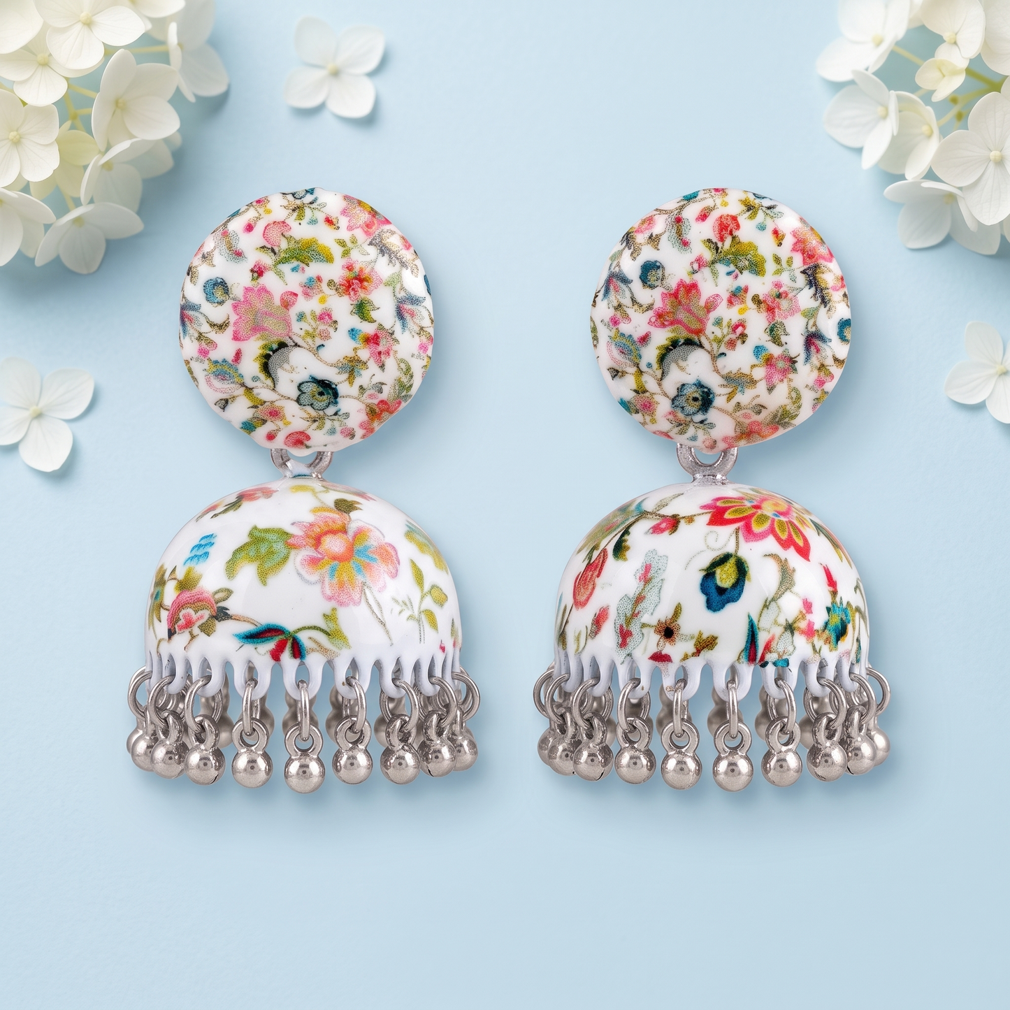 Silver Toned Brass Floral Print Jhumka Earrings