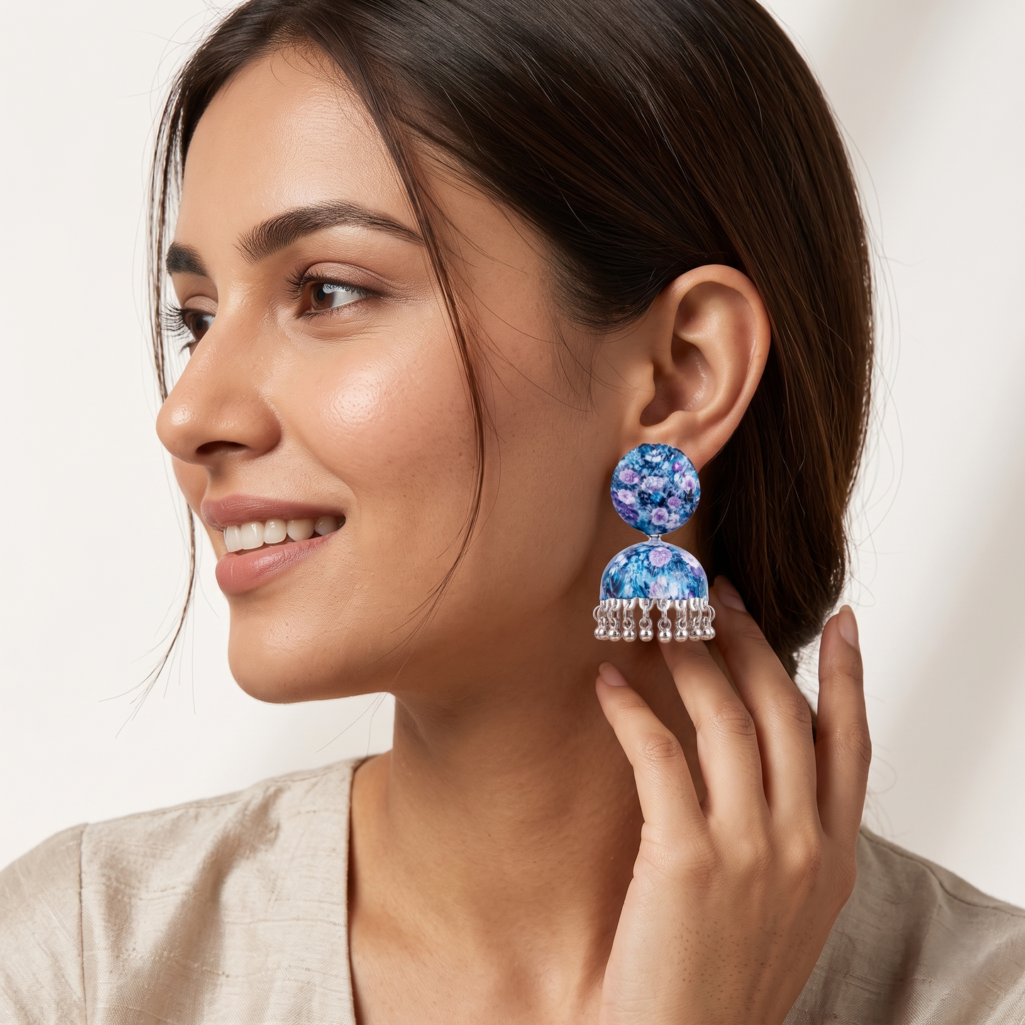 Silver Toned Brass Blue Floral Print Jhumka Earrings