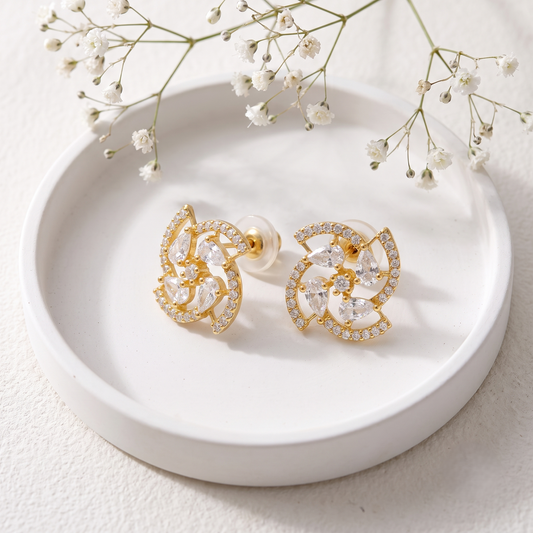 Gold Plated Brass Pinwheel Swirl Stud Earrings with Pear-Cut and Pavé Crystals