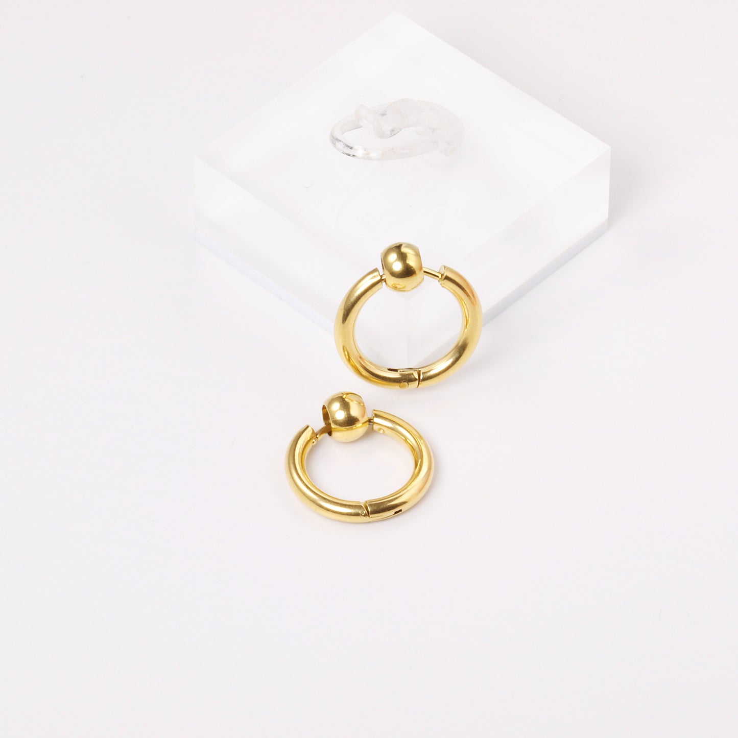 Huggie Earrings With Floating Bead