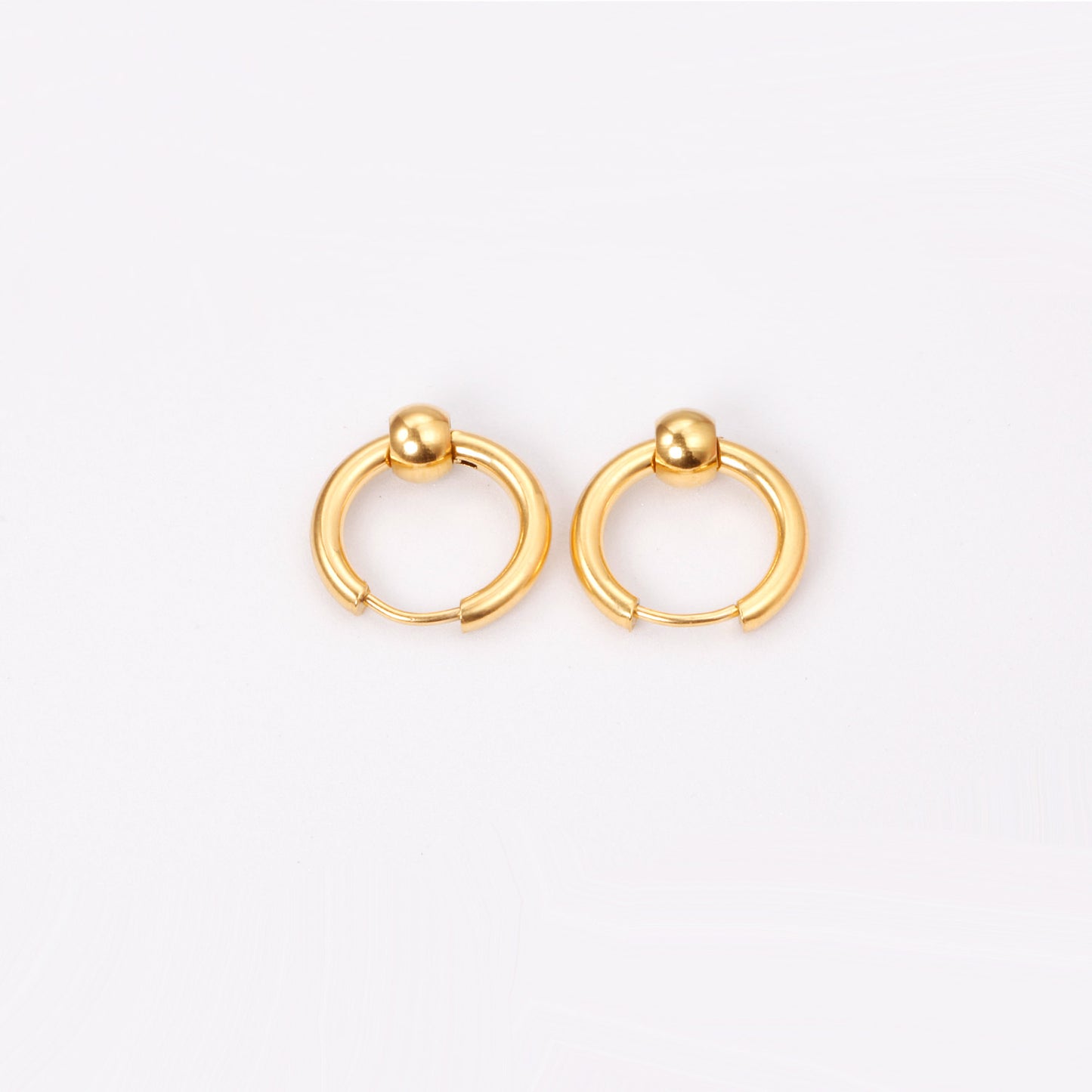 Huggie Earrings With Floating Bead